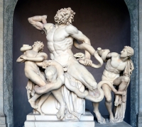 Laocoön and His Sons create the impression of astonishing beauty while observing the scene of dying and stumbling